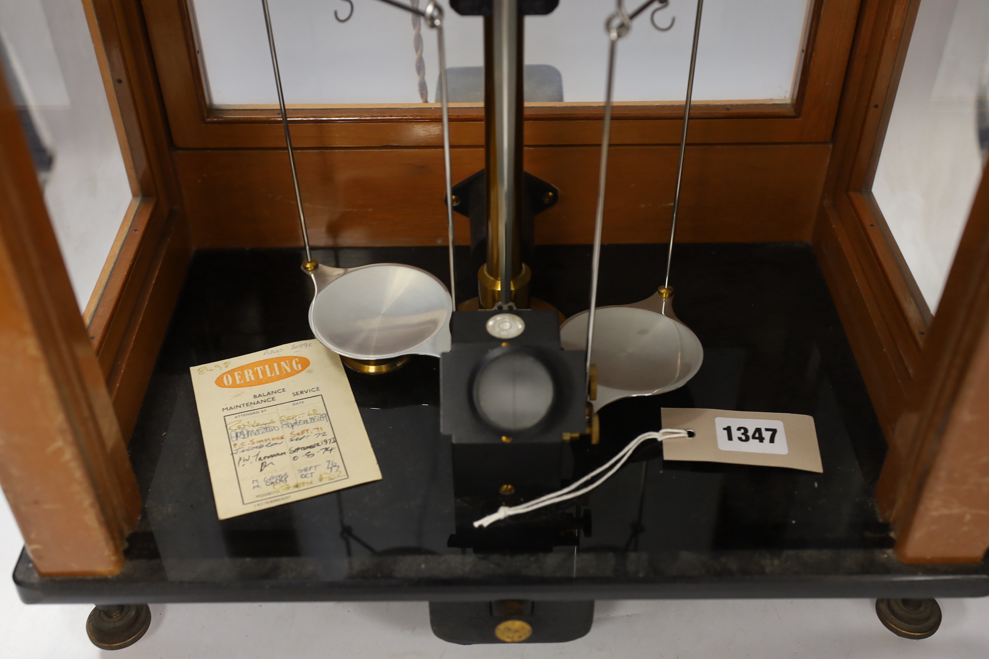 A teak cased scientific balance, Stanton Instruments Ltd. scales Model AD2, with sliding front access panel, 46 x 46 x 26cm